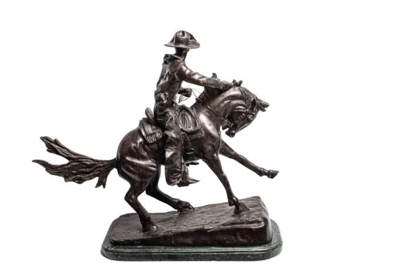 Cowboy bronze statue by paul dubois